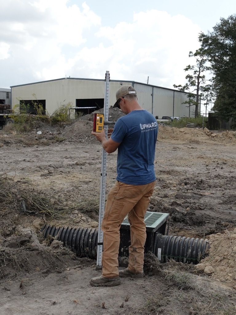 Laser grade surveying
